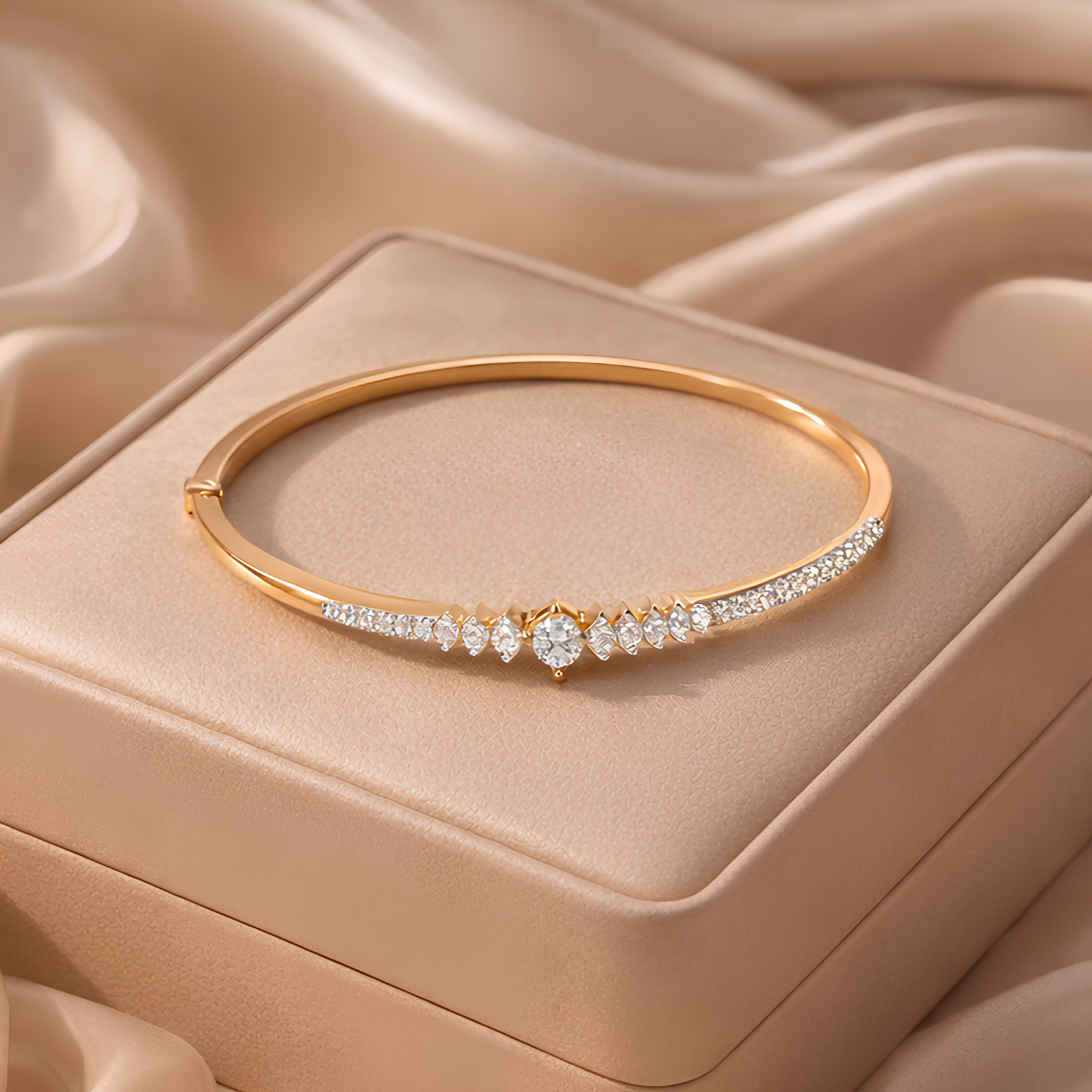 Gold bracelet with diamonds on a beige jewelry box
