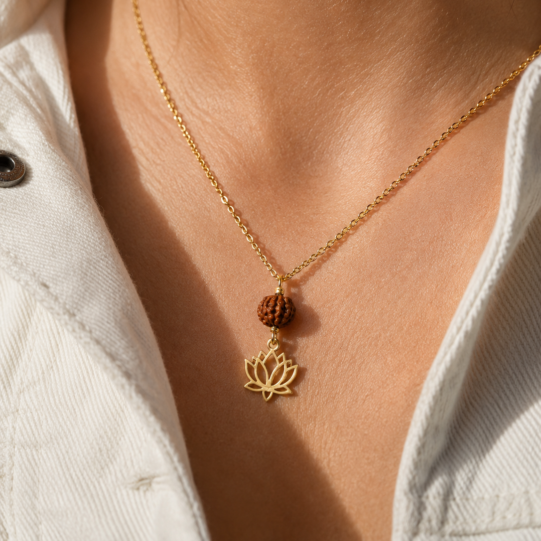 Gold lotus necklace with a round rudraksha pendant 