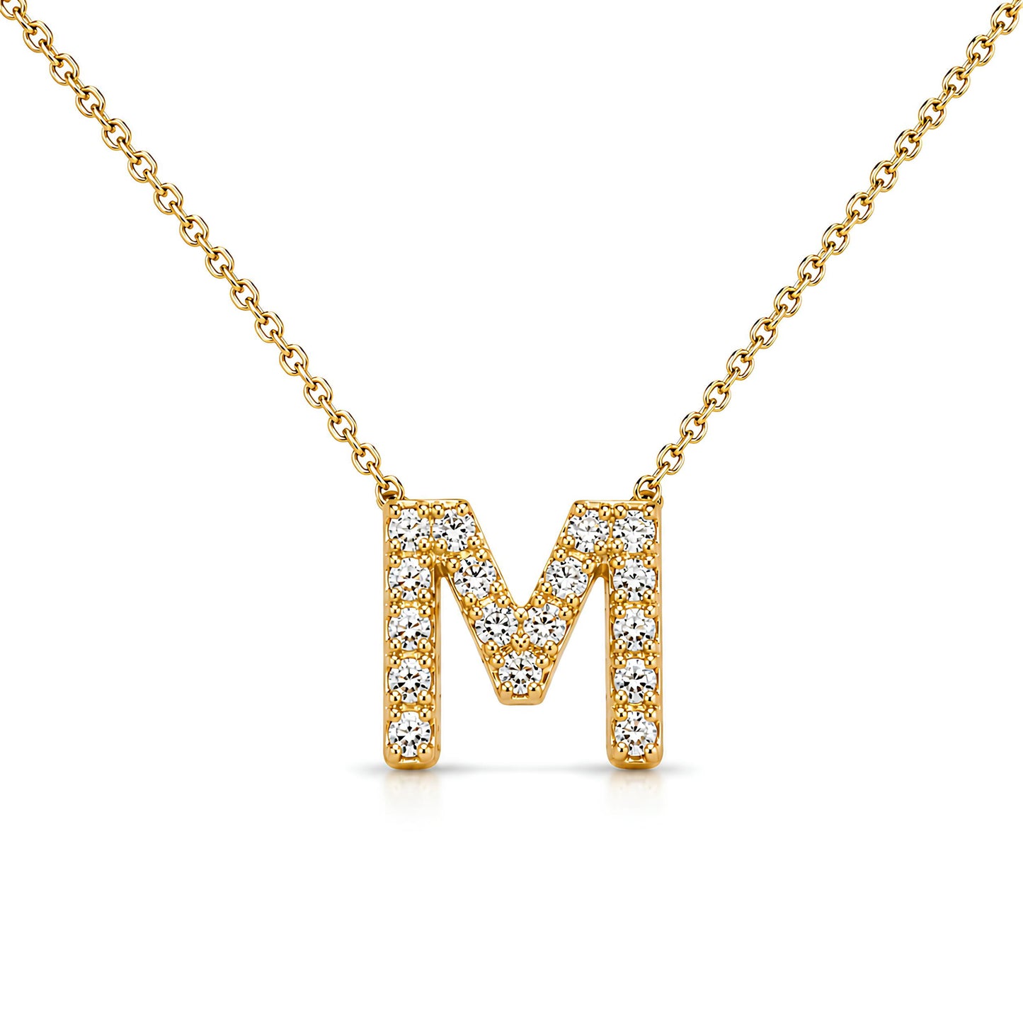 Gold necklace with a diamond-studded 'M' pendant