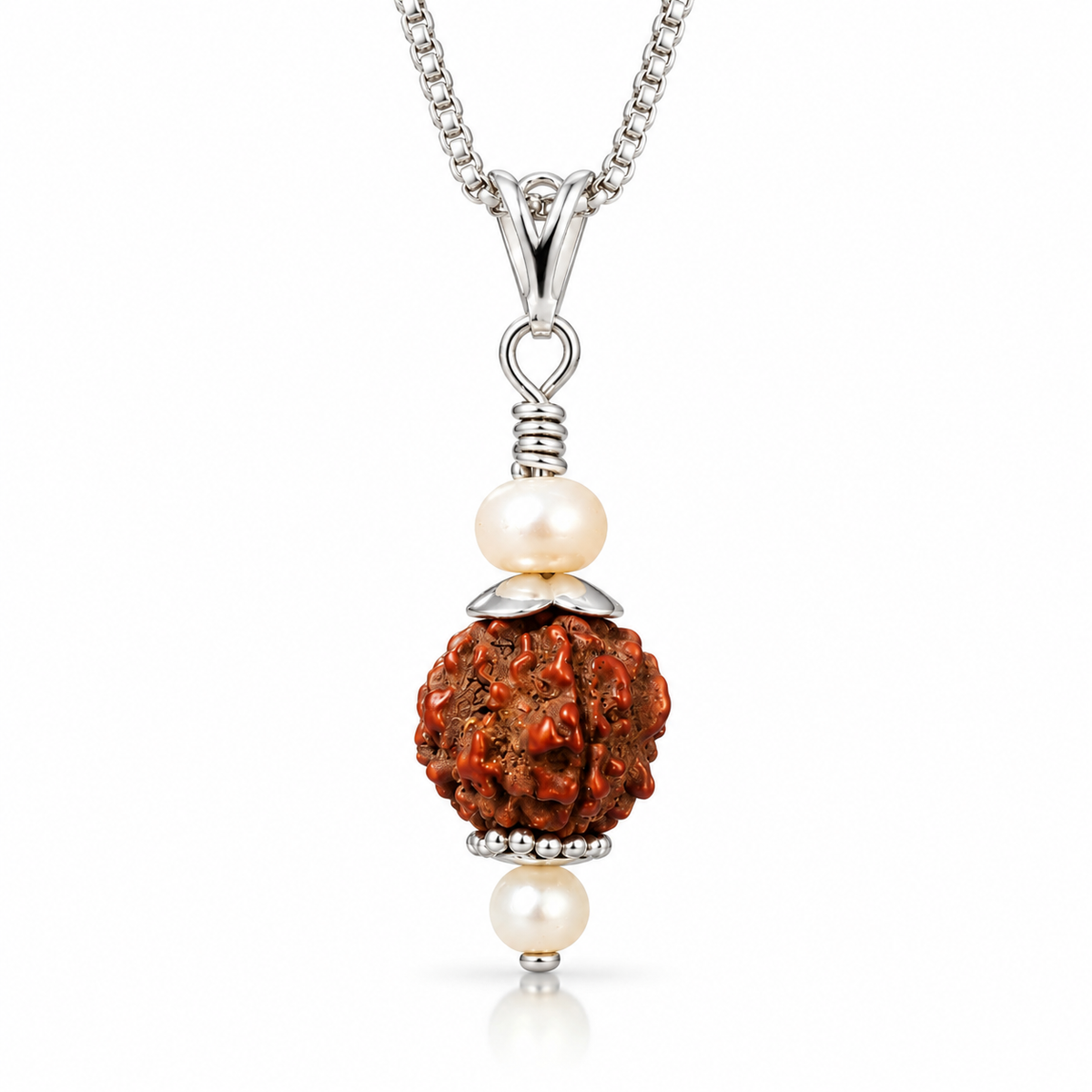 A silver chain necklace featuring a pendant with a textured reddish-brown rudraksha bead, flanked by two white freshwater pearls and accented with silver beads, shown on a white background.