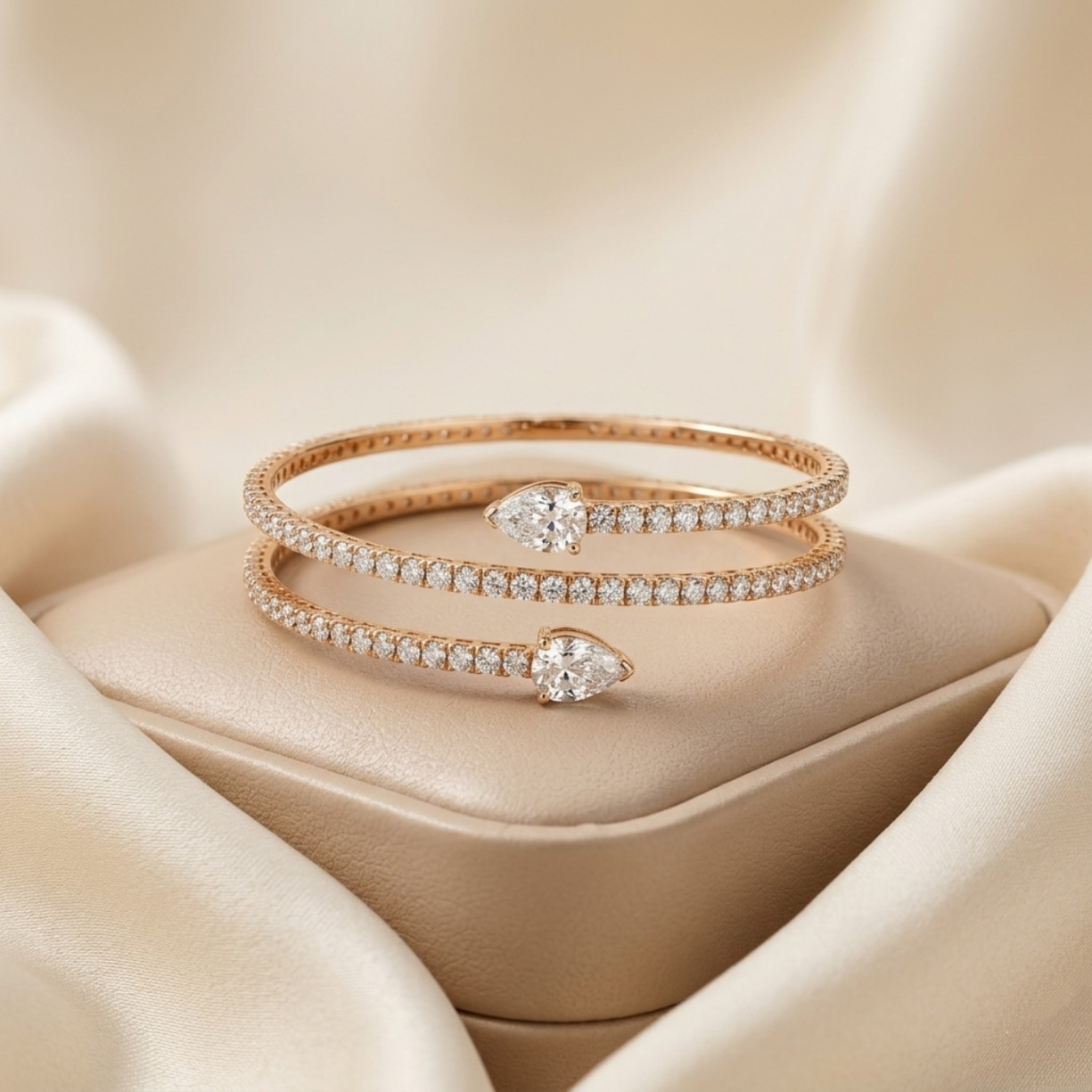 Rose gold bracelet with diamond accents on a beige fabric background