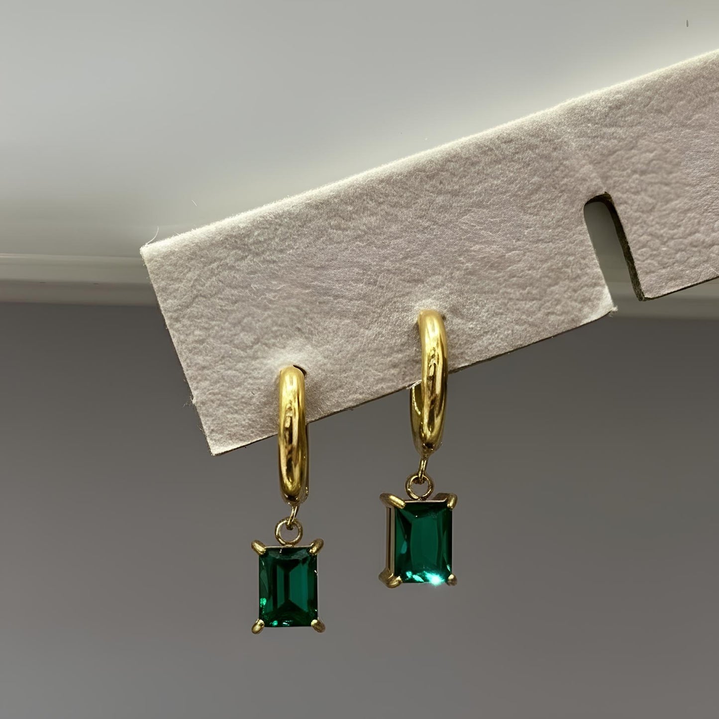 emerald dangle earrings