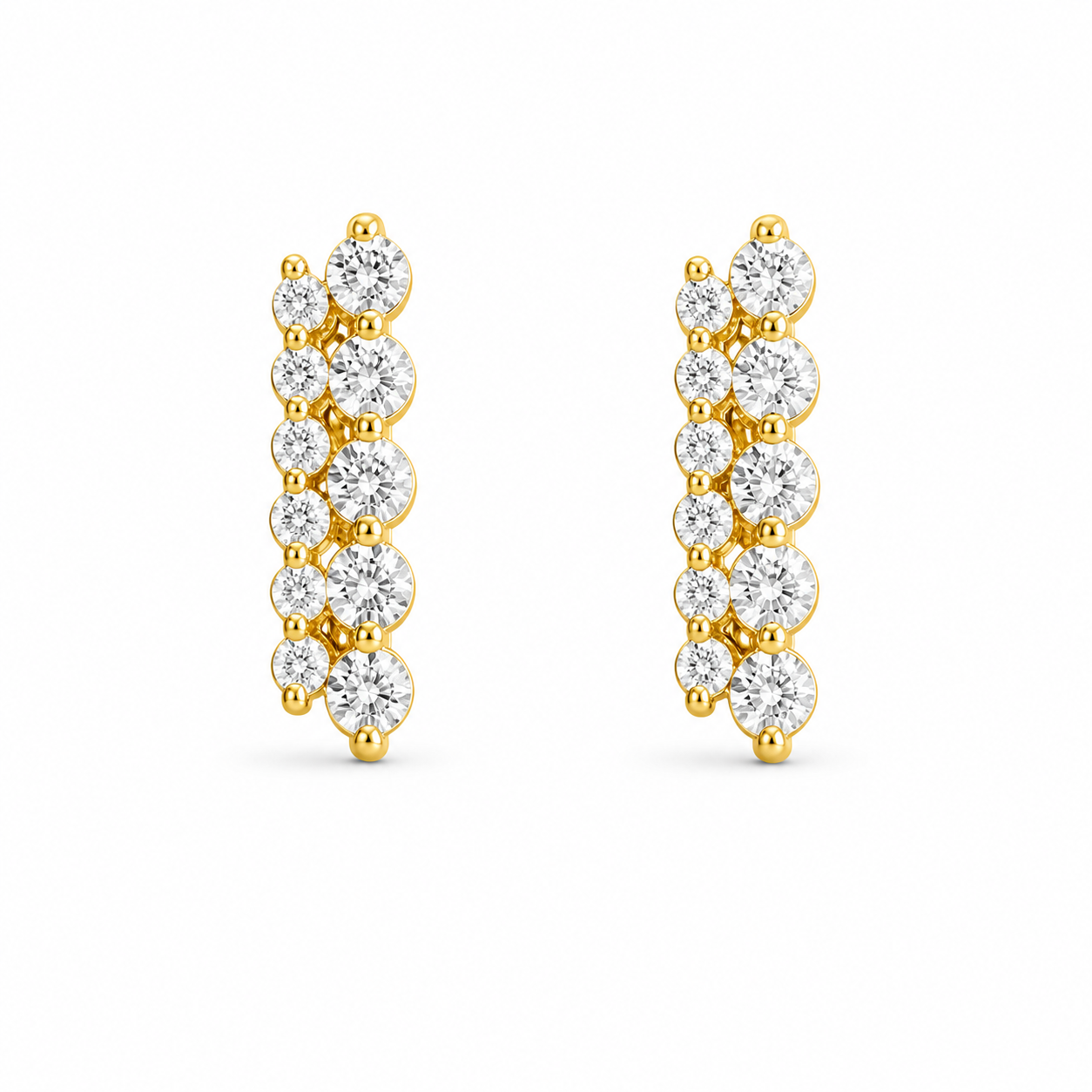 gold earrings set with multiple round-cut clear gemstones in a vertical, cascading cluster design