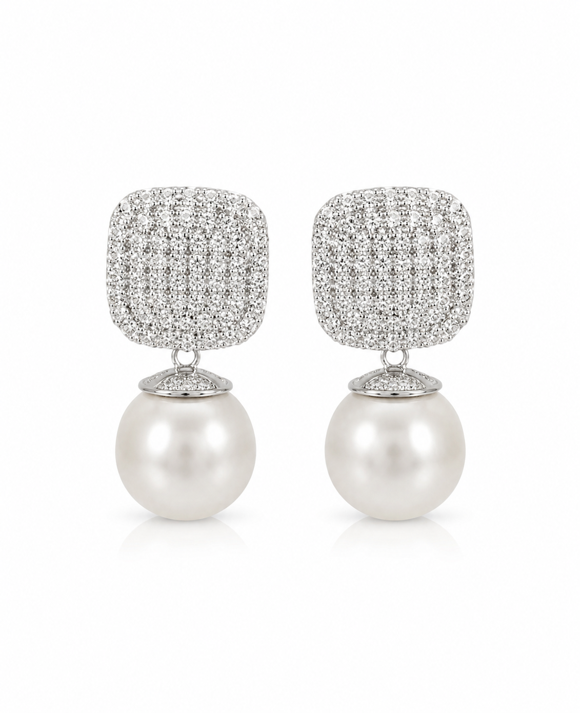 square stud earrings featuring pavé-set clear diamonds on a silver-toned setting, with a large white pearl hanging below