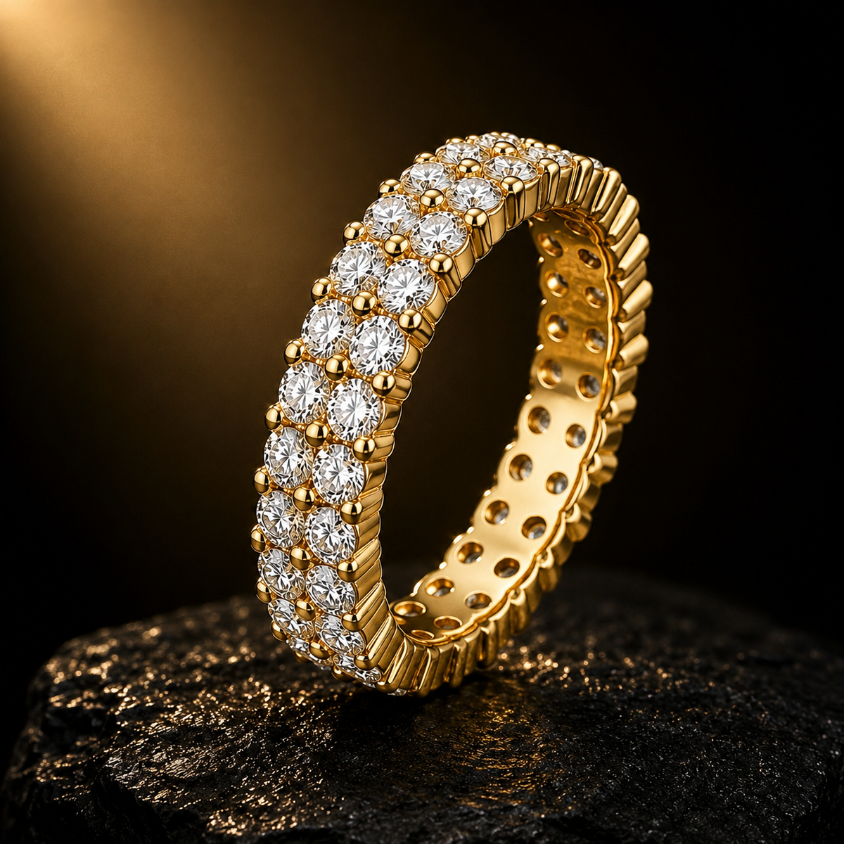 yellow gold eternity ring with a double row of round-cut clear gemstones