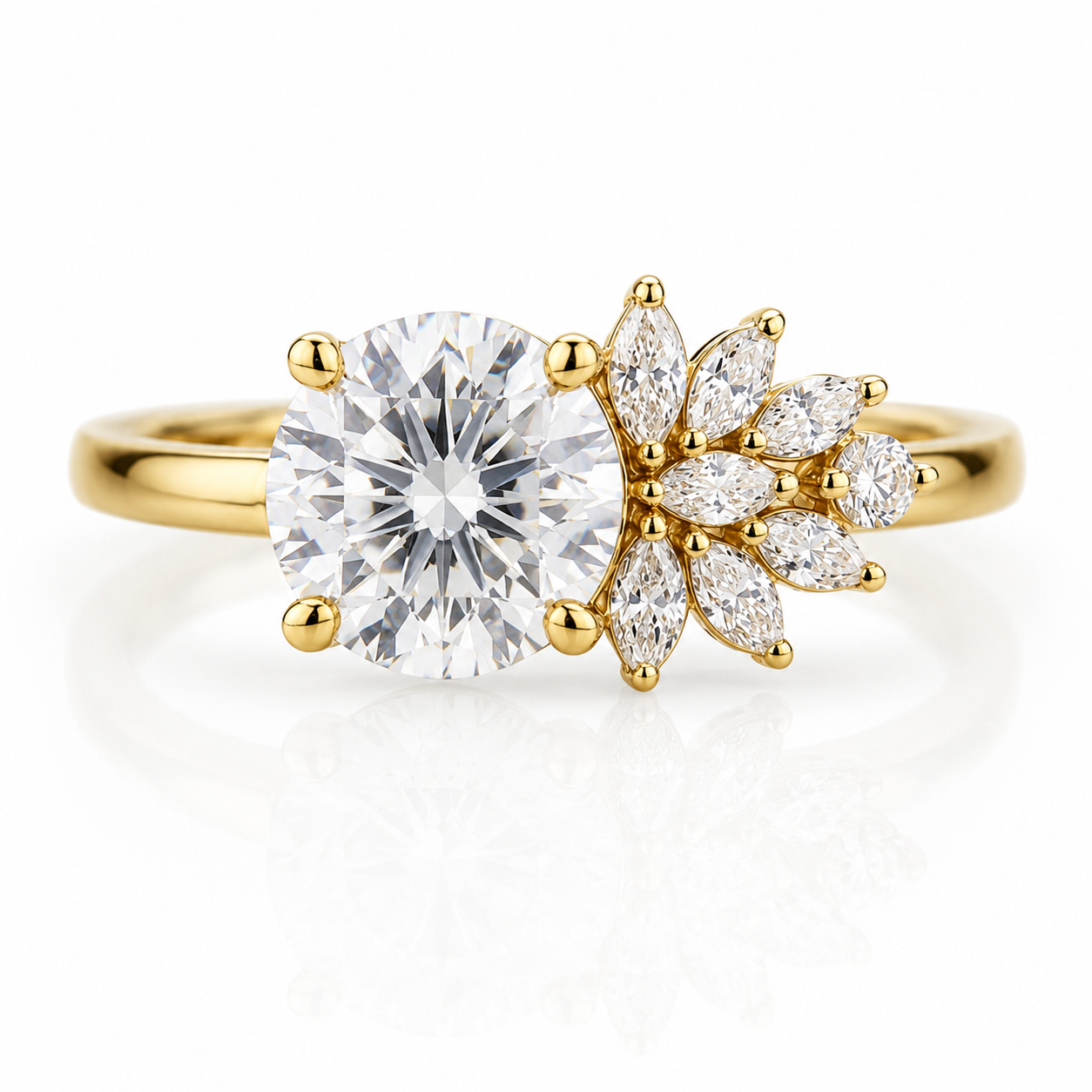 A yellow gold ring featuring a large round brilliant-cut center stone and a marquise-cut stone cluster on the right side, set against a clean white background.